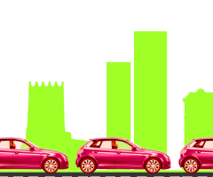 червоні машини на фоні зелених будинків