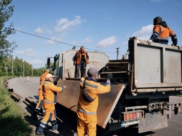 ремонт дорога робітники