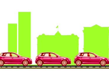 червоні машини на фоні зелених будинків