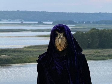 людина в масці